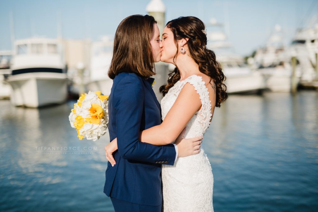 Same sex couple on dock at Water Table wedding, Virginia Beach