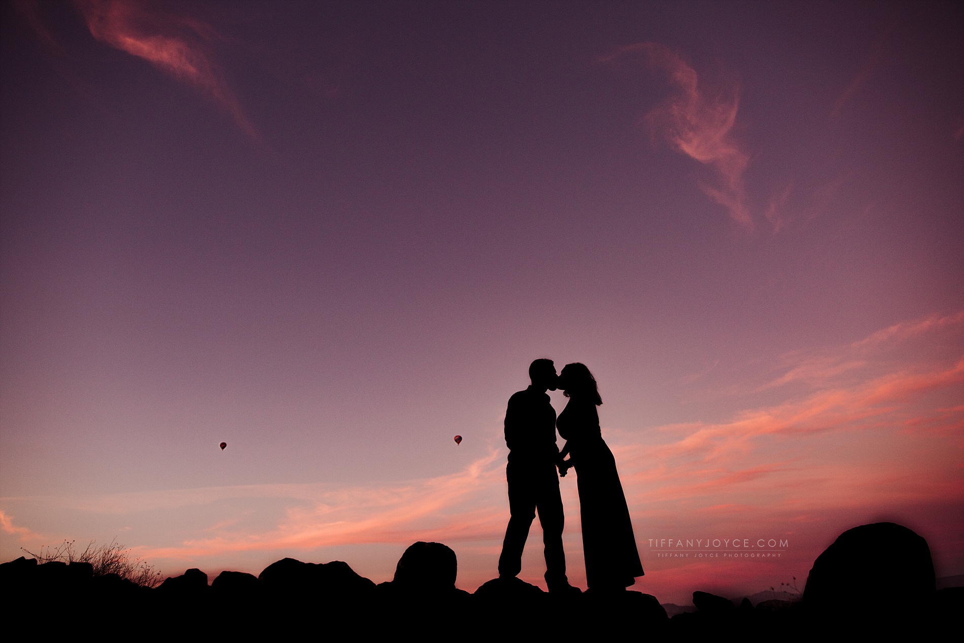 Couple silhouette at sunset during North Phoenix engagement session